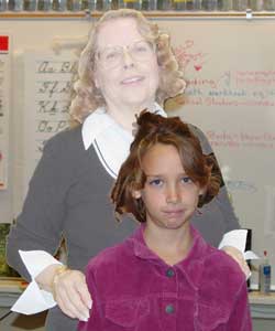 Parent behind student